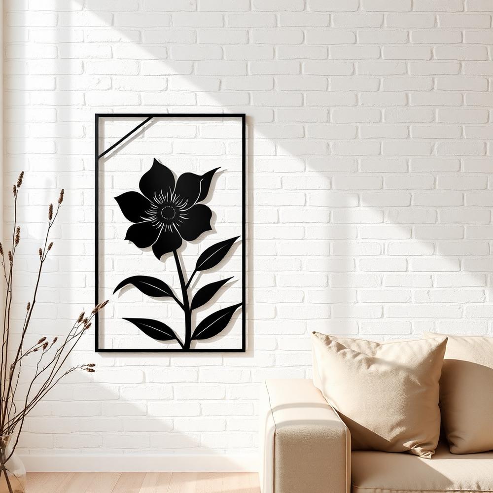 Black metal botanical flower artwork with a thin rectangular frame on a white brick wall